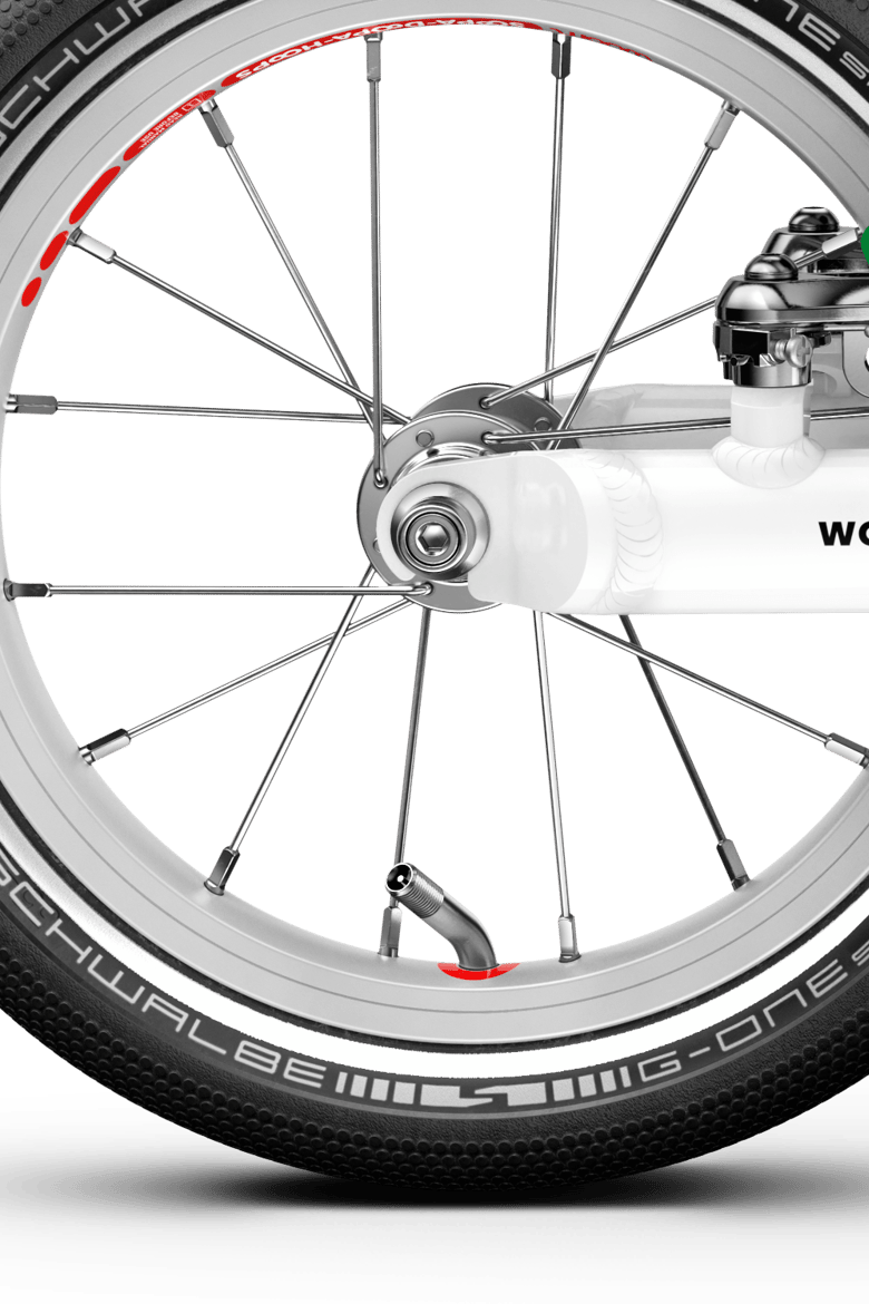 Rear 12″ wheel with extra narrow hub on the woom GO 1 balance bike