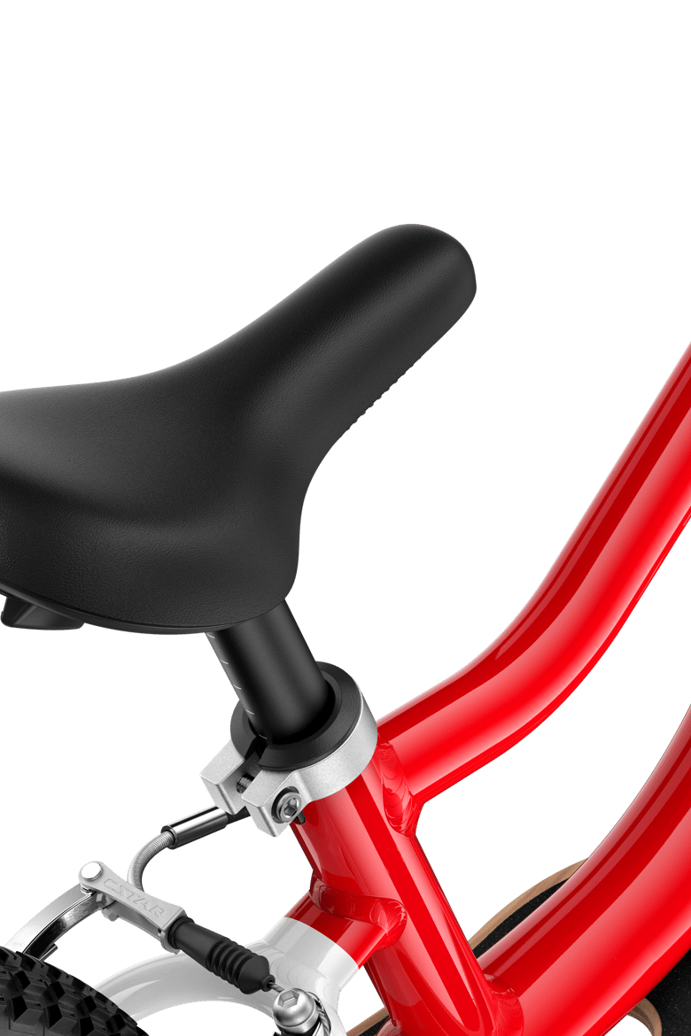 Detailed view of the banana-shaped saddle on the woom GO 1 PLUS balance bike