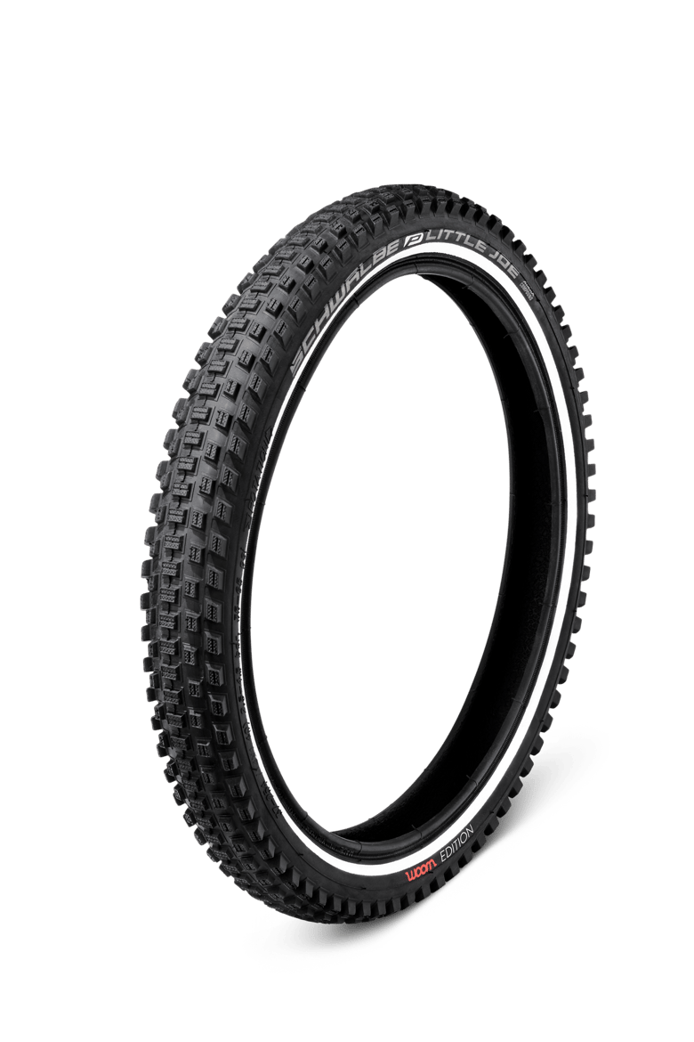 Detailed view of the front 14″ wheel on the woom GO 2 children's bike