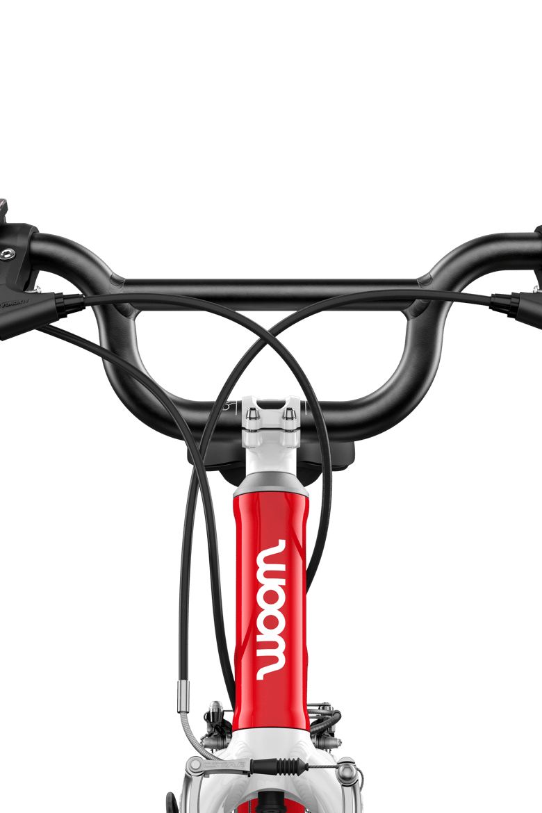 Detailed view of the stem, handlebars and grips on the woom GO 4 children's bike