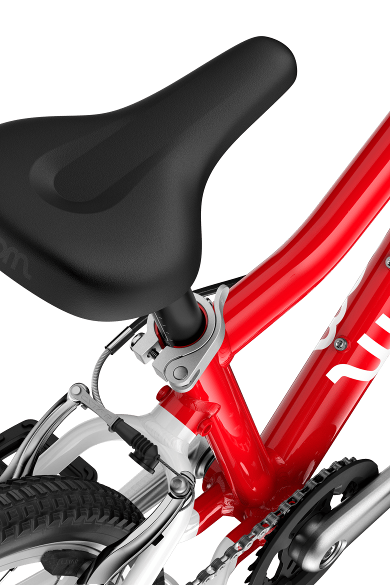 Detailed view of the saddle on the woom GO 4 children's bike