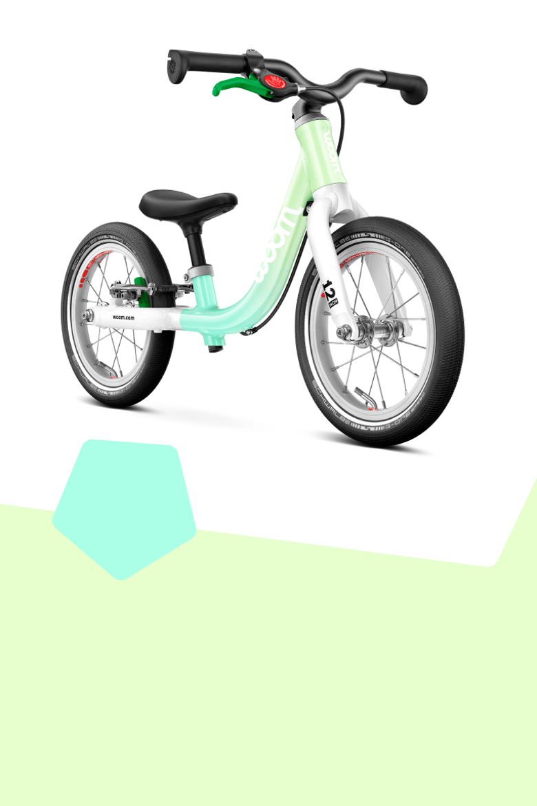 Seitliche Frontansicht des Fahrrades woom GO 3 in spearmint crush in 16 Zoll für Kinder von in etwa 4 bis 6 Jahren