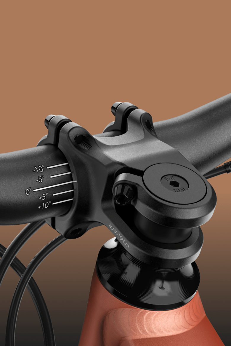 Zoom sur la potence et le guidon noirs d'un VTT woom OFF AIR.