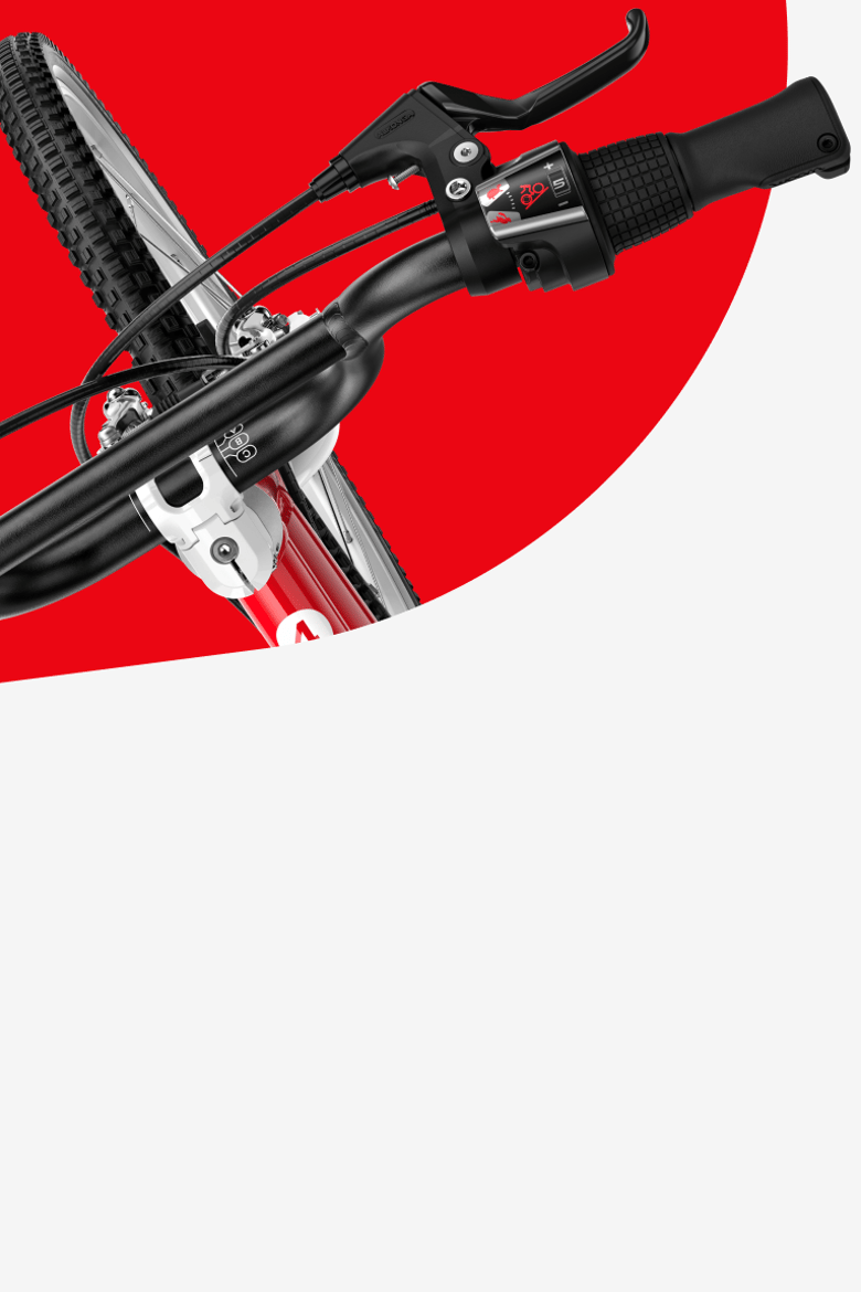 Detail van de draaischakelaar op de woom GO 4 kinderfiets.