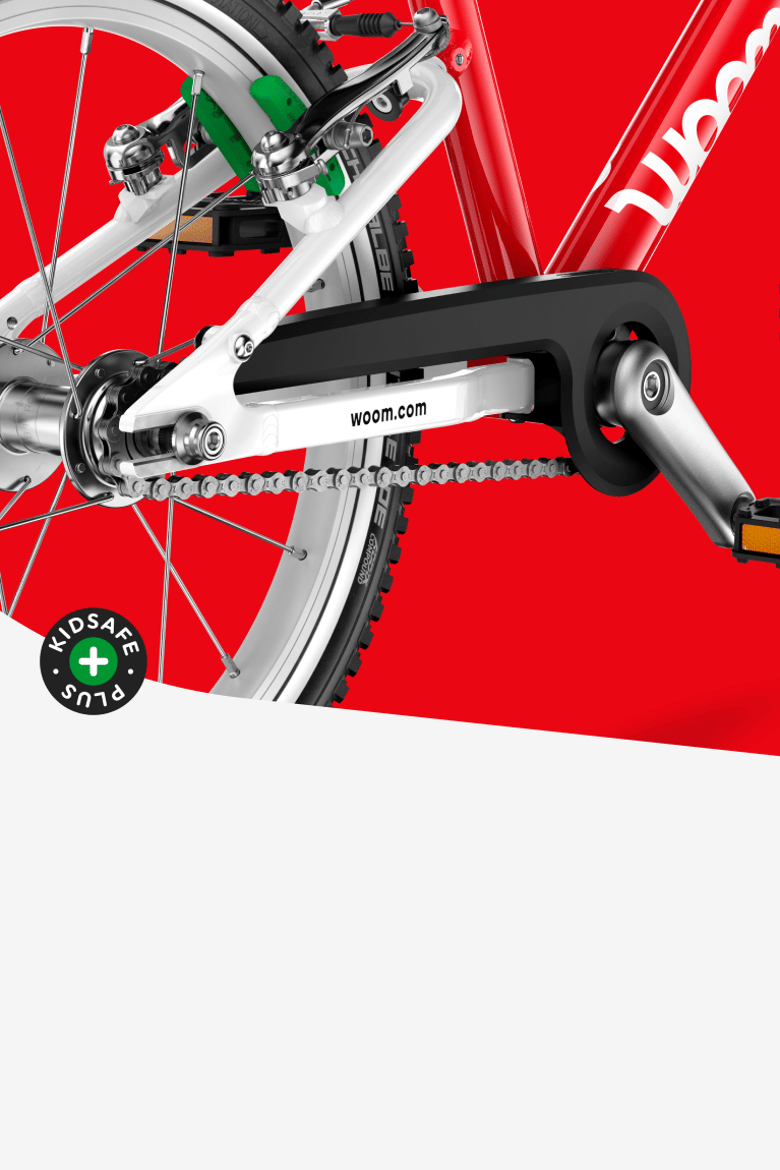 Detailed view of the one-winged chainguard on the woom GO 3 AUTOMAGIC bike
