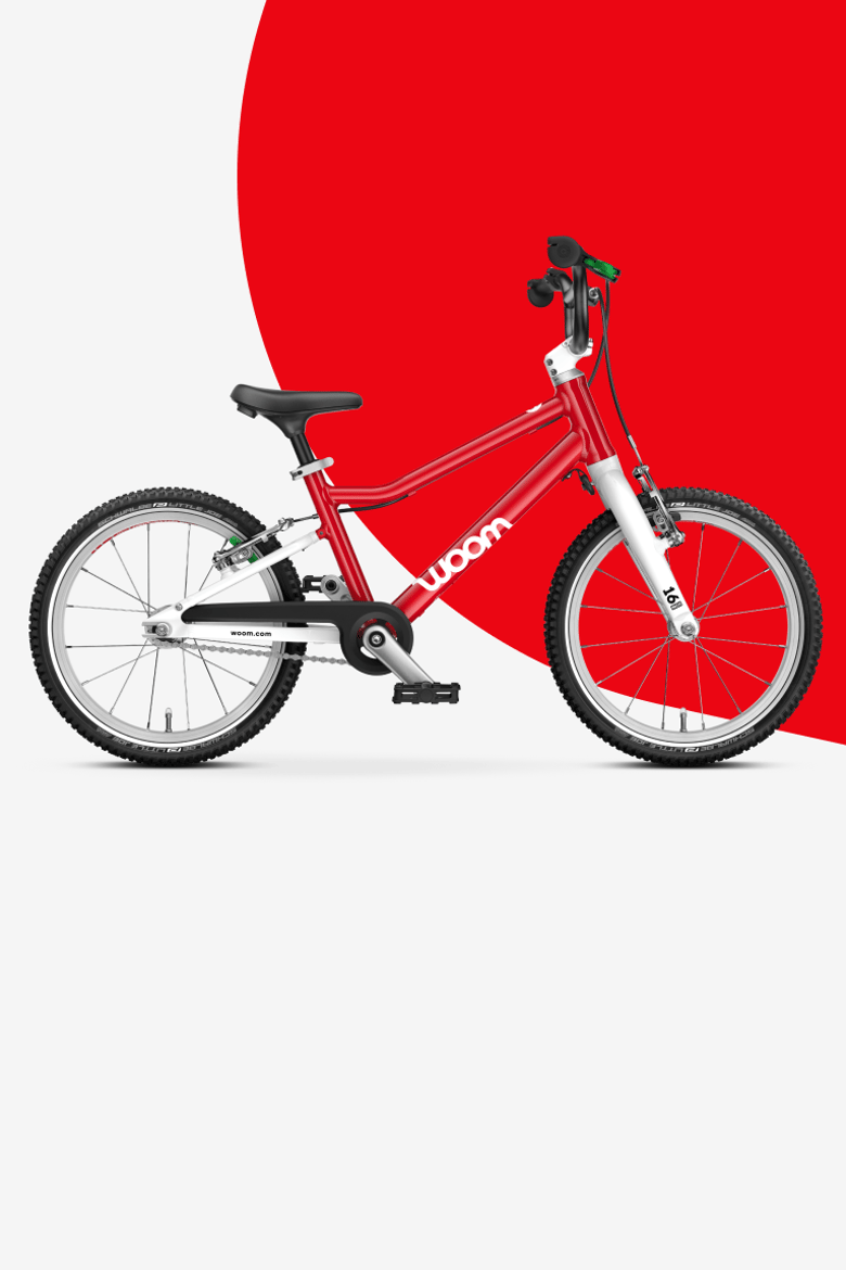Zijgoraanzicht van de woom GO 3 kinderfiets voor kinderen vanaf 4 jaar.