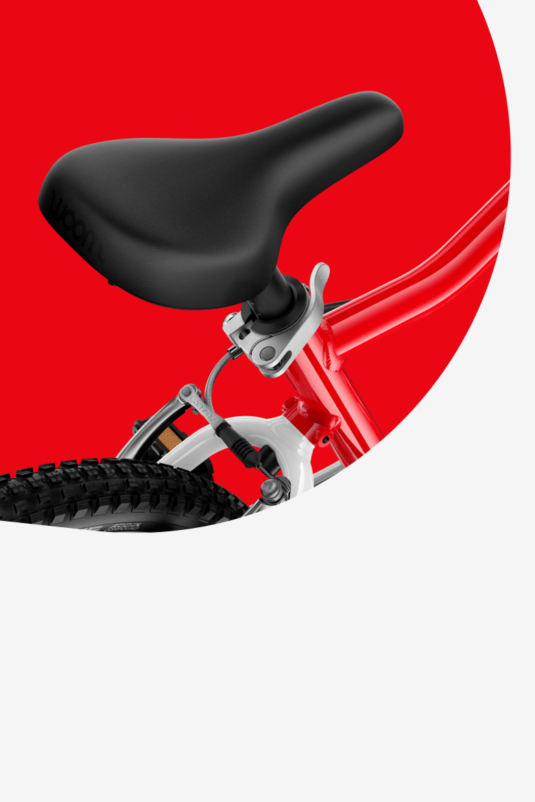 Detailed view of the saddle on the woom GO 3 AUTOMAGIC children's bike