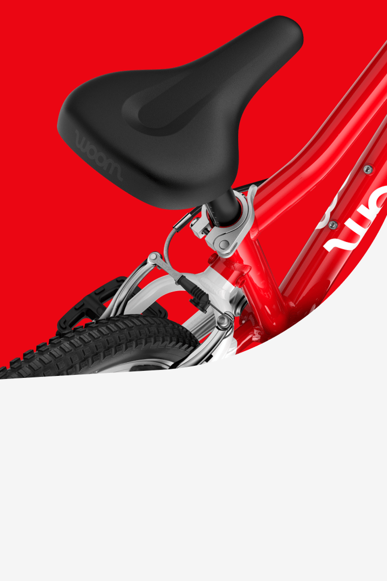 Detail van het zadel op de woom GO 4 kinderfiets.