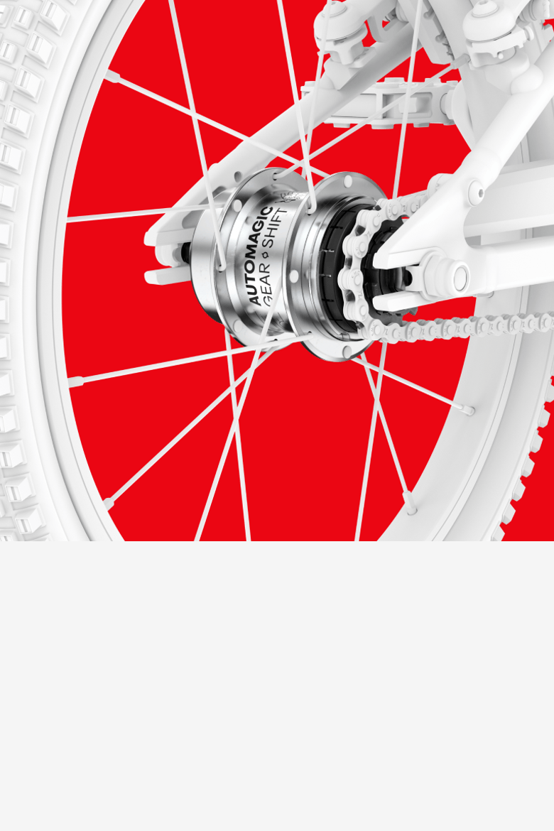 Detailed view of the hub gearing on a white woom GO 3 AUTOMAGIC bike