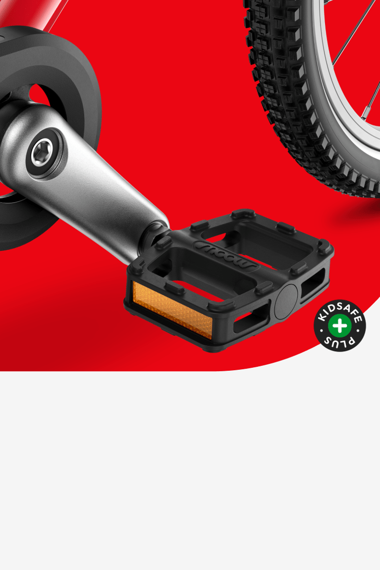 Detail van de cranks, pedalen en kettingkast op de woom GO 3.