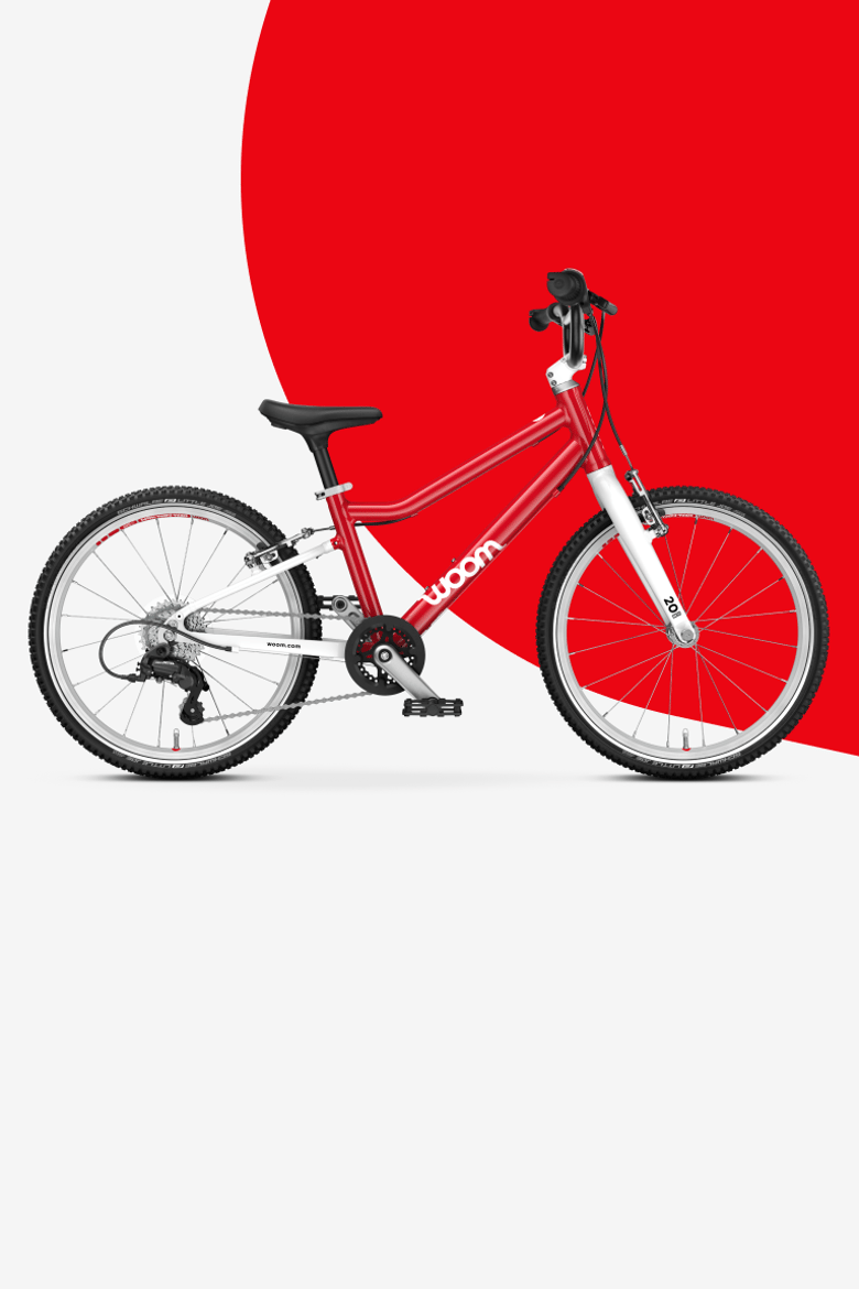 Zijgoraanzicht van de woom GO 4 kinderfiets voor kinderen vanaf 6 jaar.