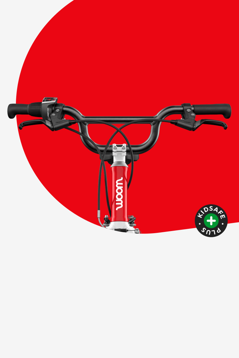 Detail van stuurpen, stuur en handvatten op de woom GO 4 kinderfiets.