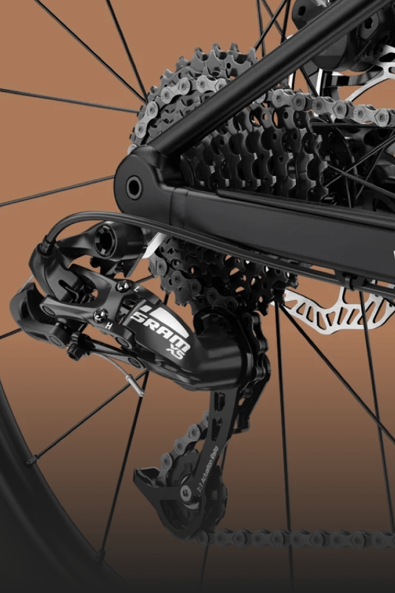 Detailed view of the SRAM X5 rear derailleur on the woom OFF kids' mountain bike