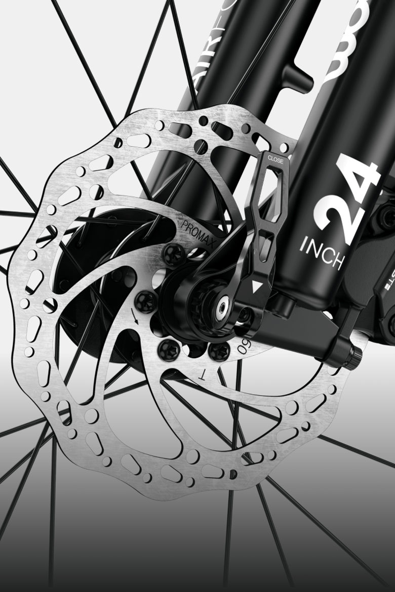 Detailed shot of the hydraulic disc brake on the front wheel of the woom UP cirrus cloud.