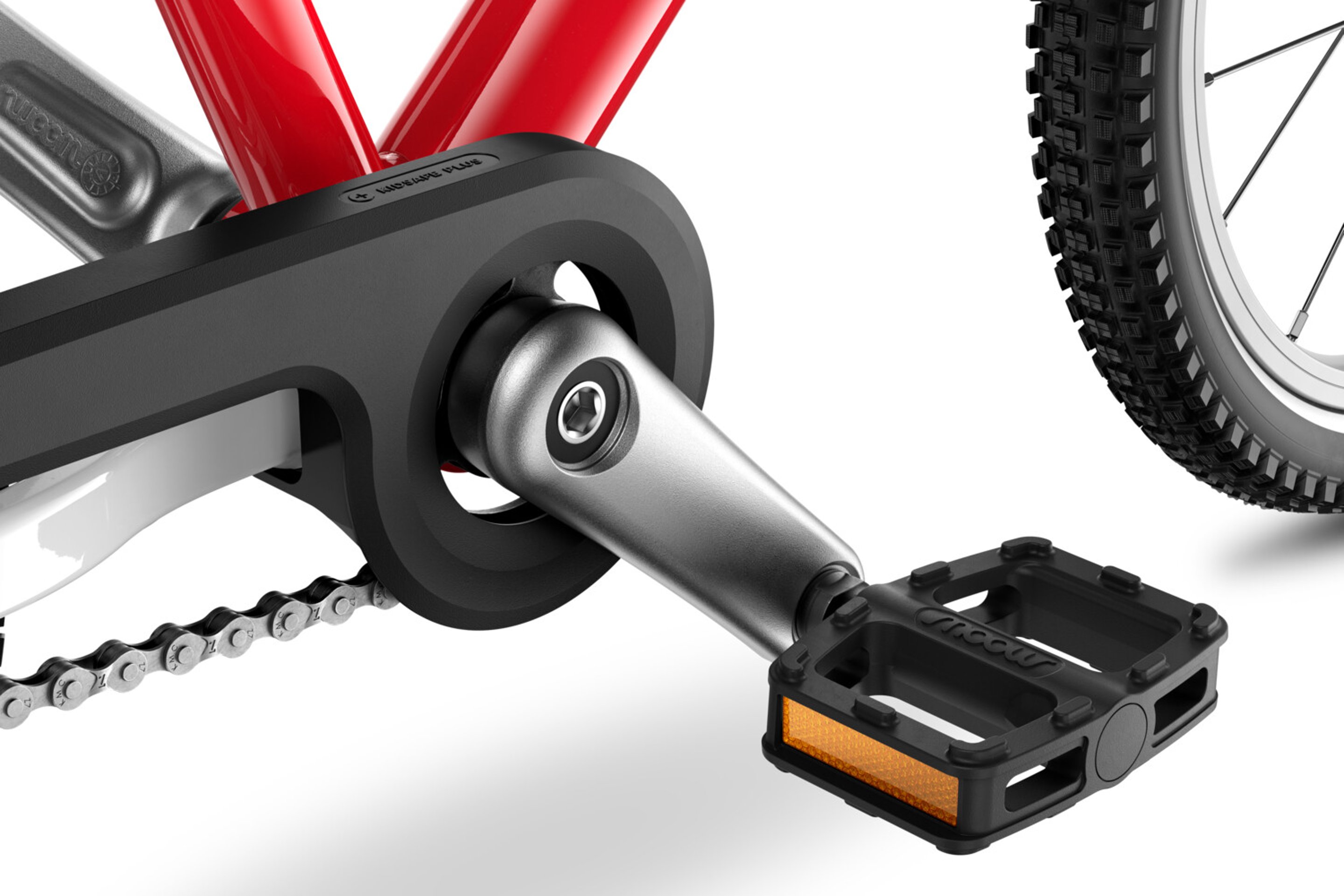 Detailaanzicht van de crank, pedalen en kettingkast van de woom GO 3-kinderfiets