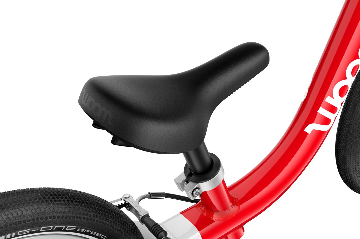 Detailed view of the banana-shaped saddle on the woom GO 1 balance bike