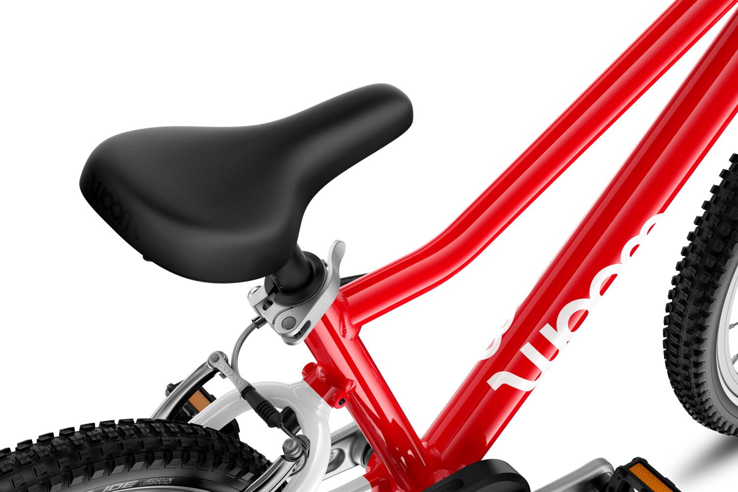 Detailed view of the saddle on the woom GO 3 AUTOMAGIC children's bike