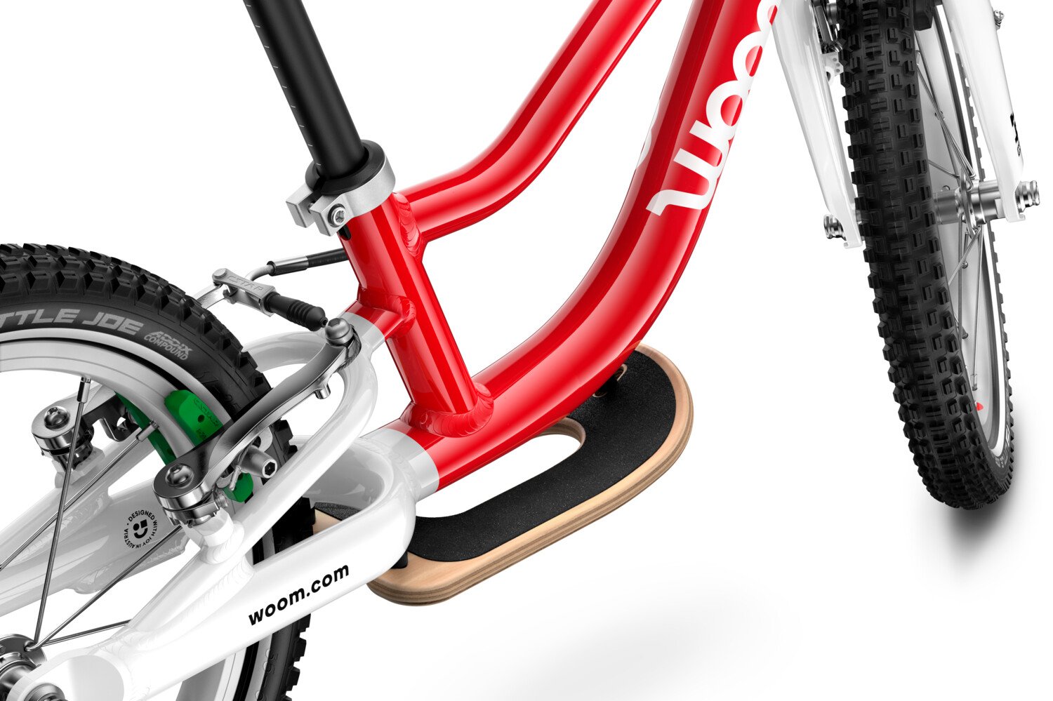 Detailed view of the wooden footrest that can be added to the woom GO 1 balance bike