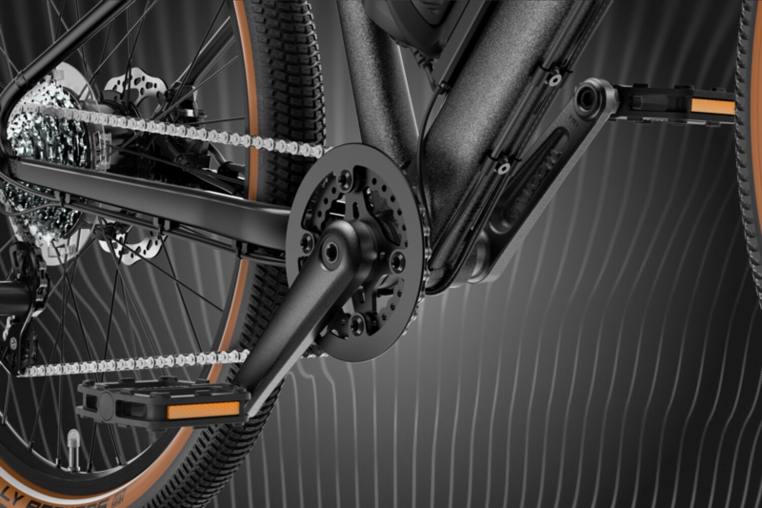 Detailansicht der Kurbel, der Pedale und des Hinterrads am woom EXPLORE e E-Bike.
