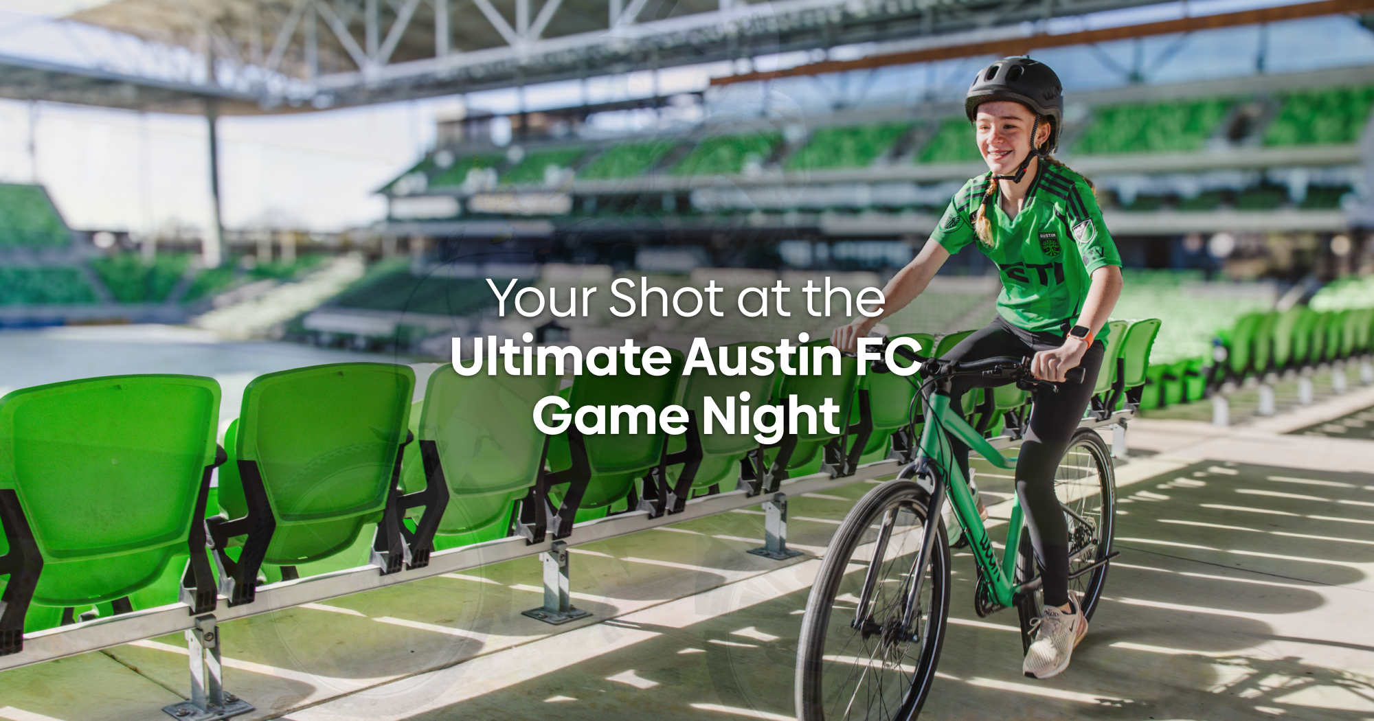 A preteen girl rides a jungle green woom EXPLORE bike through Q2 Stadium, home of Austin FC, with overlay text reading: Your Shot at the Ultimate Austin FC Game Night.