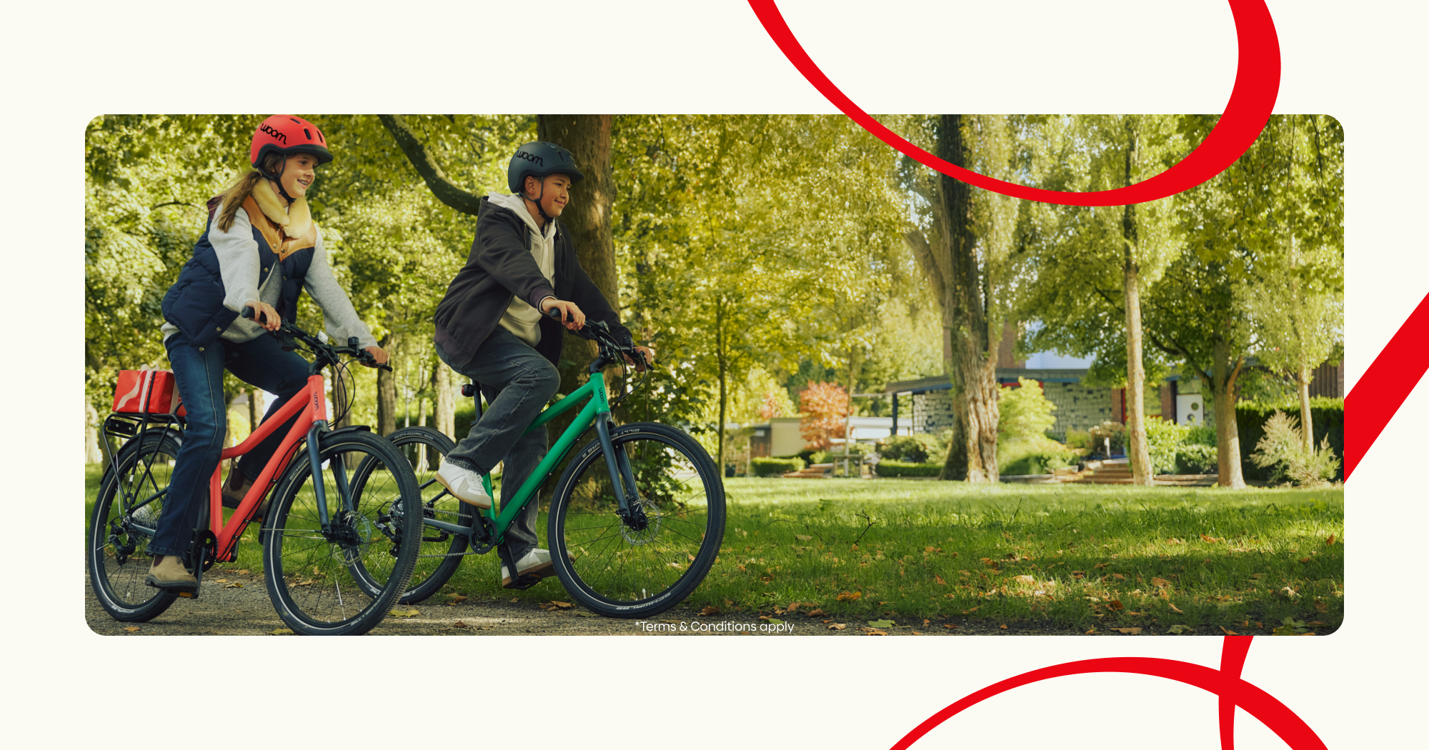 An image of two young teens riding their neon coral and jungle green woom EXPLORE bikes through a bike, overlaid on a cream background with red ribbons