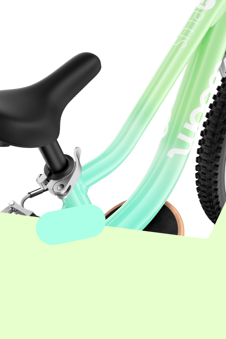 Detailed shot of the woom GO children's bike frame in the limited edition spearmint crush colorway