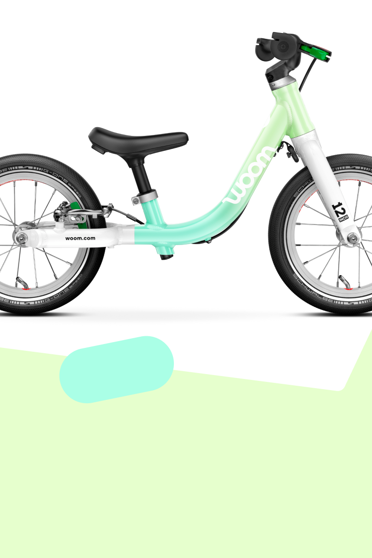 A woom GO 3 16" bike in the spearmint crush colorway for kids aged 4 to 6 years, viewed from the side