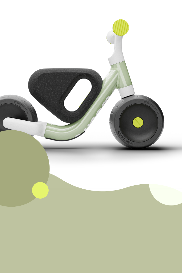 Side view of the woom WOW in green, showing the seat, saddle height, handlebars and tires.