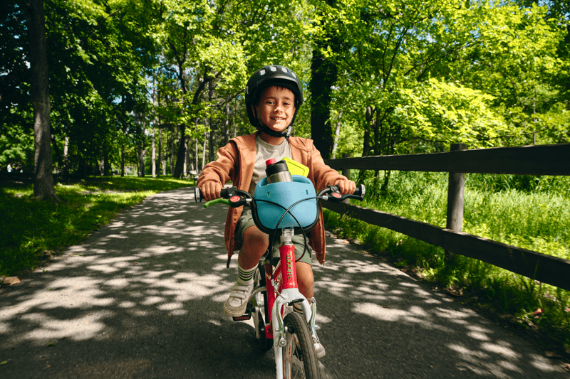 The New woom POP Kids' Bike Basket and POP ONS Basket Charms