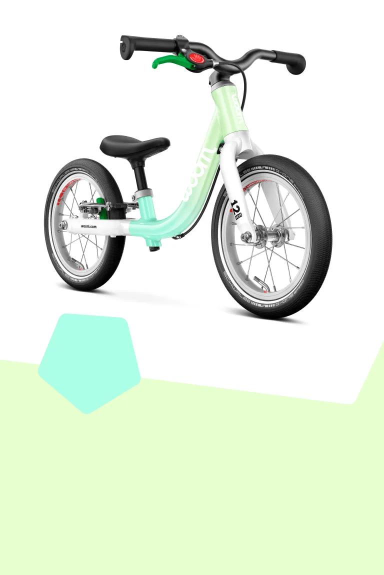 Seitliche Frontansicht des Fahrrades woom GO 3 in spearmint crush in 16 Zoll für Kinder von in etwa 4 bis 6 Jahren