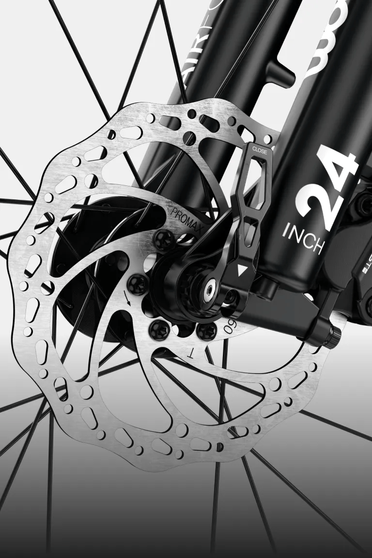 Detailed shot of the hydraulic disc brake on the front wheel of the woom UP cirrus cloud.