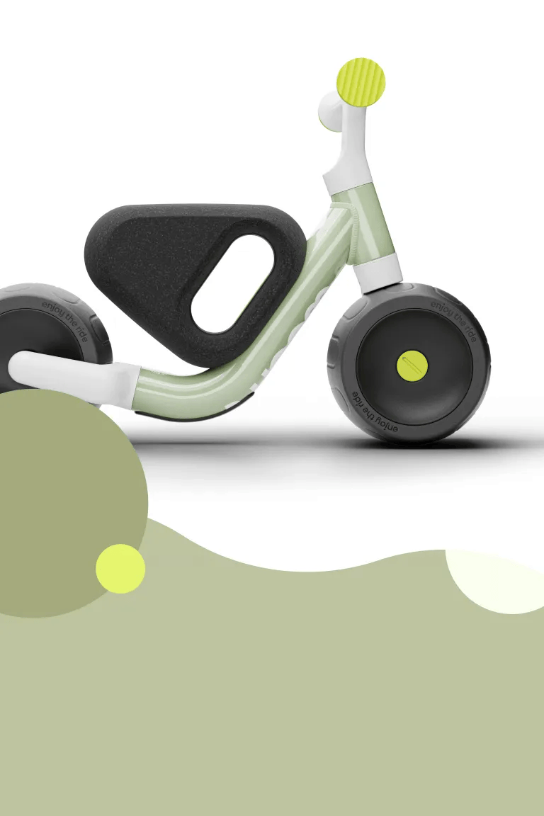 Side view of the woom WOW in green, showing the seat, saddle height, handlebars and tires