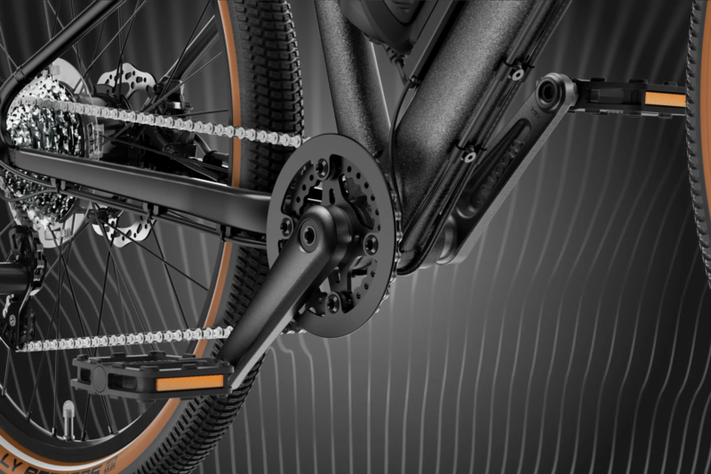 Gros plan sur le pédalier et la roue arrière du vélo électrique woom EXPLORE e.